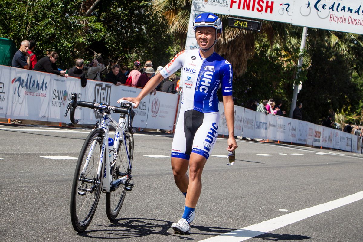 Coryn Rivera (UnitedHealthcare) walks her bike across the finish after a mishap.