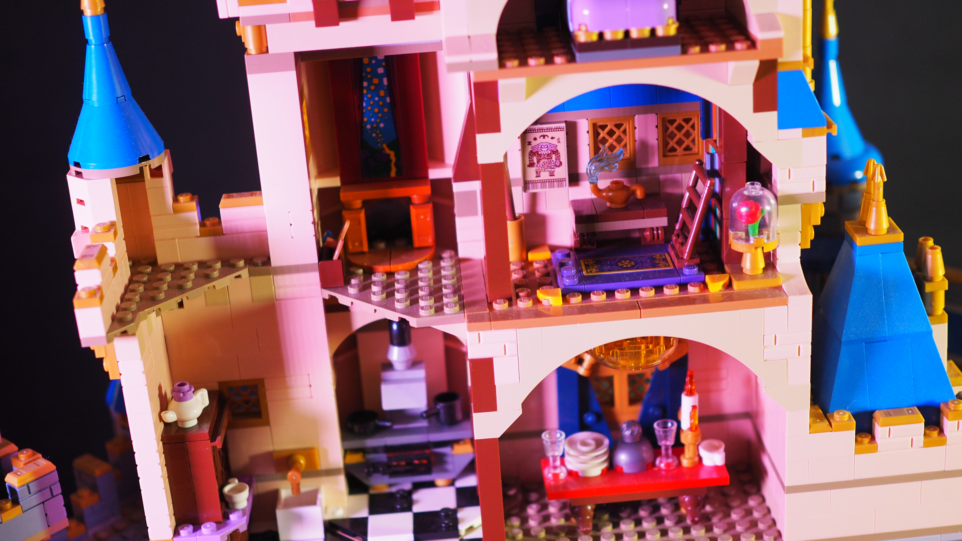 Some interior rooms from the Lego Disney Castle set, against a black background