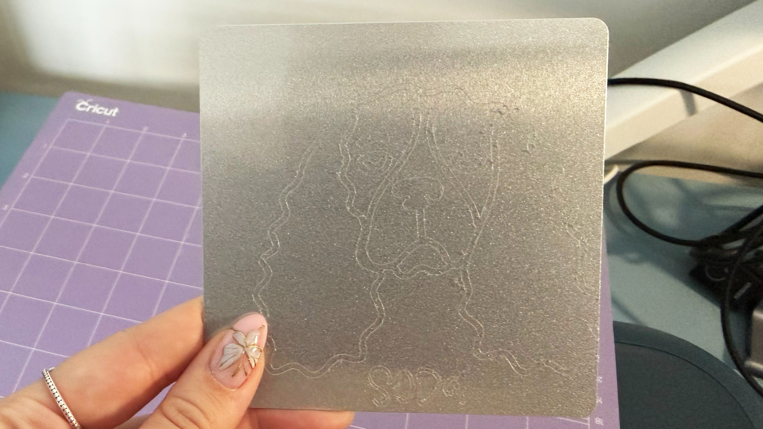 Person using Cricut Maker 5