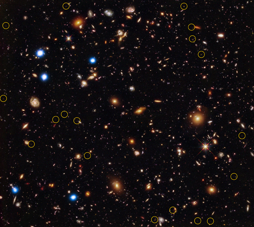 This image shows a close-up of the Chandra Deep Field South, as well an optical and infrared image from the Hubble Space Telescope of the same field. The views, and other Chandra X-ray Observatory observations, shows growing black holes have been detected