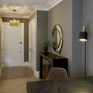hallway with grey textured wallcovering