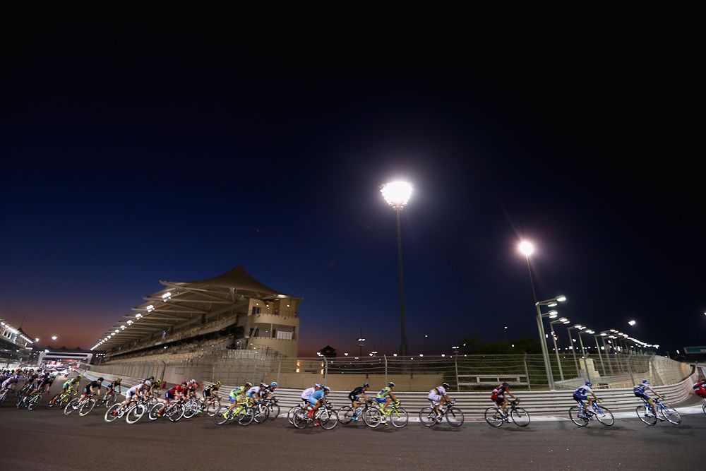 The peloton races under lights in Abu Dhabi