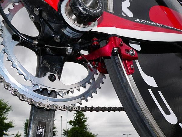 Rear brake is tucked behind and below