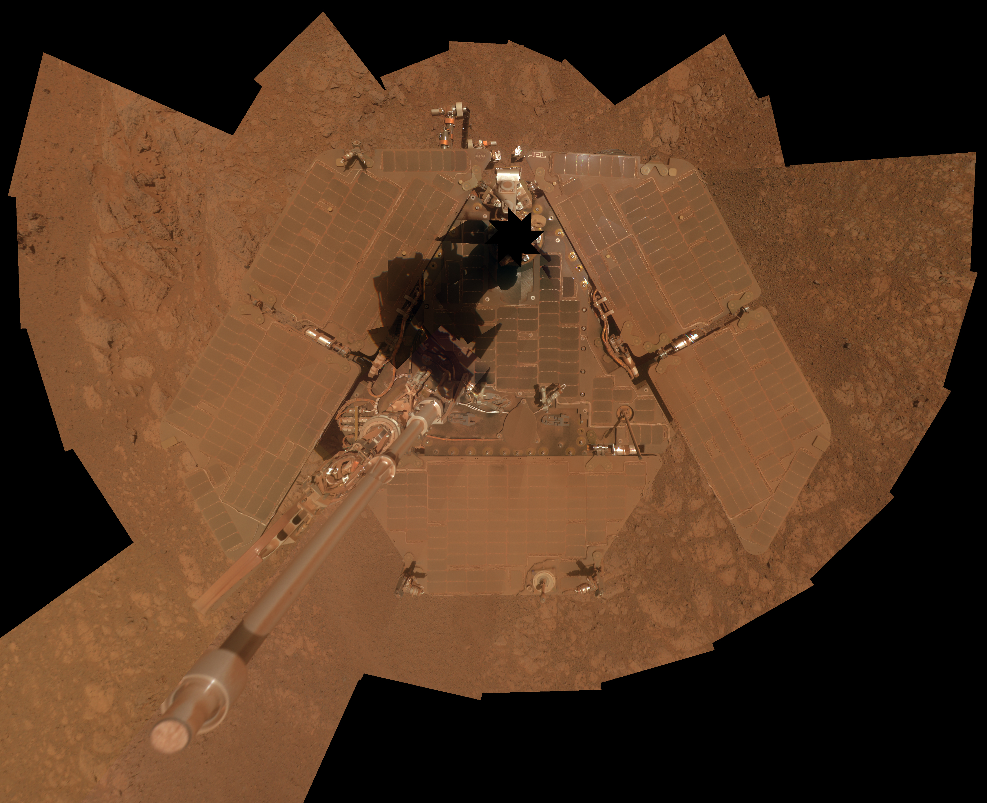 NASA&#039;s Mars Exploration Rover Opportunity recorded the component images for this self-portrait about three weeks before completing a decade of work on Mars. The rover&#039;s panoramic camera (Pancam) took the images between Jan. 3 and Jan. 6, 2014.