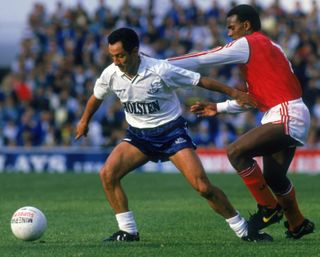 Osvaldo Ardiles shields the ball from David Rocastle in a match between Tottenham and Arsenal in October 1987.