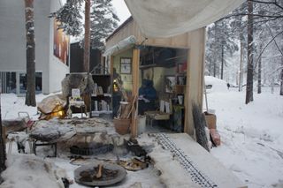 Small sheltered home in the snow