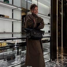 renia jaz at harrods trying on a celine bag