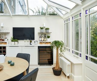 Conservatory with home bar and dining table