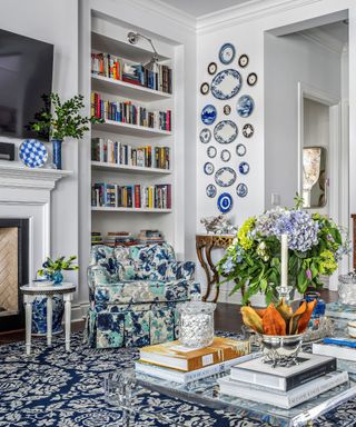 A blue and white maximalist living room