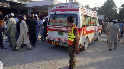 An ambulance at the scene of an explosion in Pakistan
