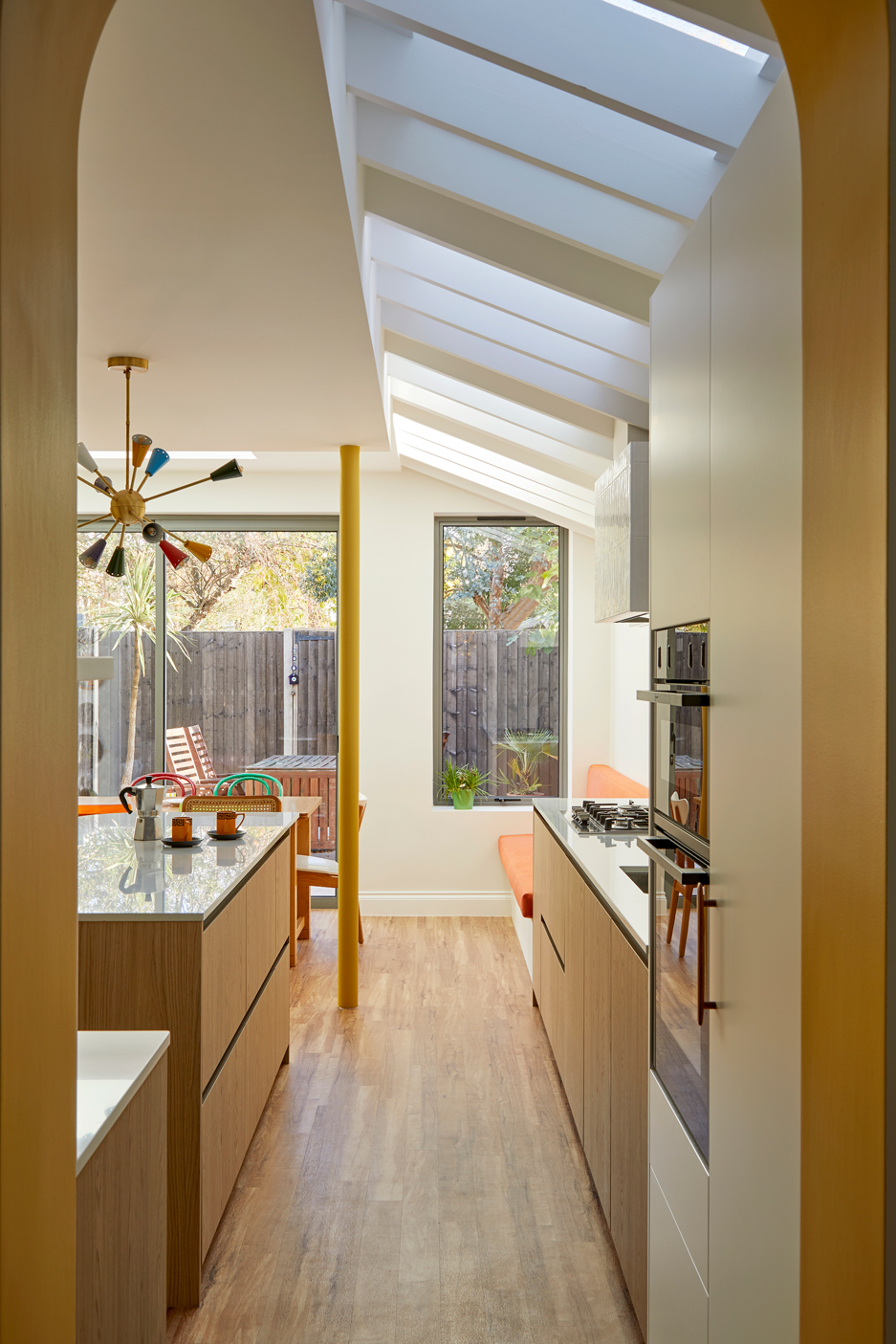 interior of West London extension Ealing return, a colourful modern kitchen addition