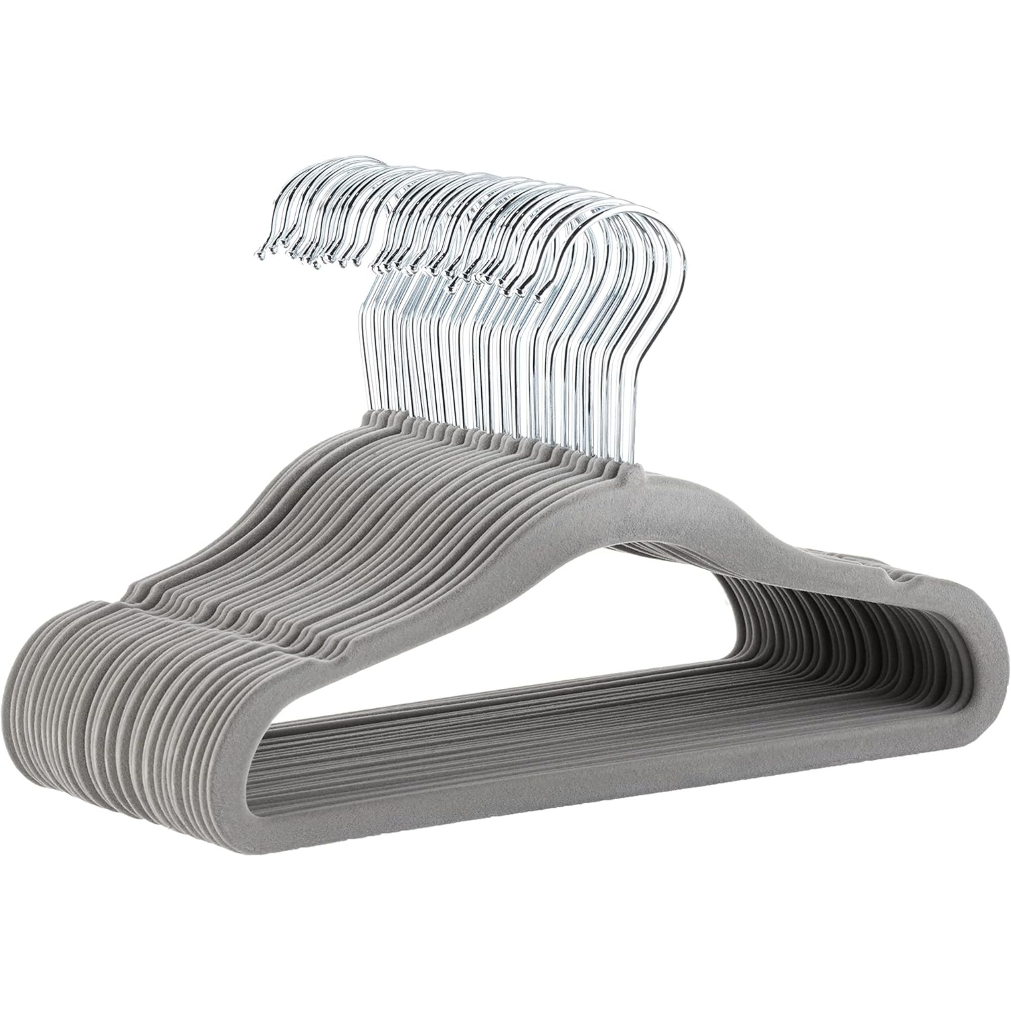 A pack of grey velvet hangers with silver hooks