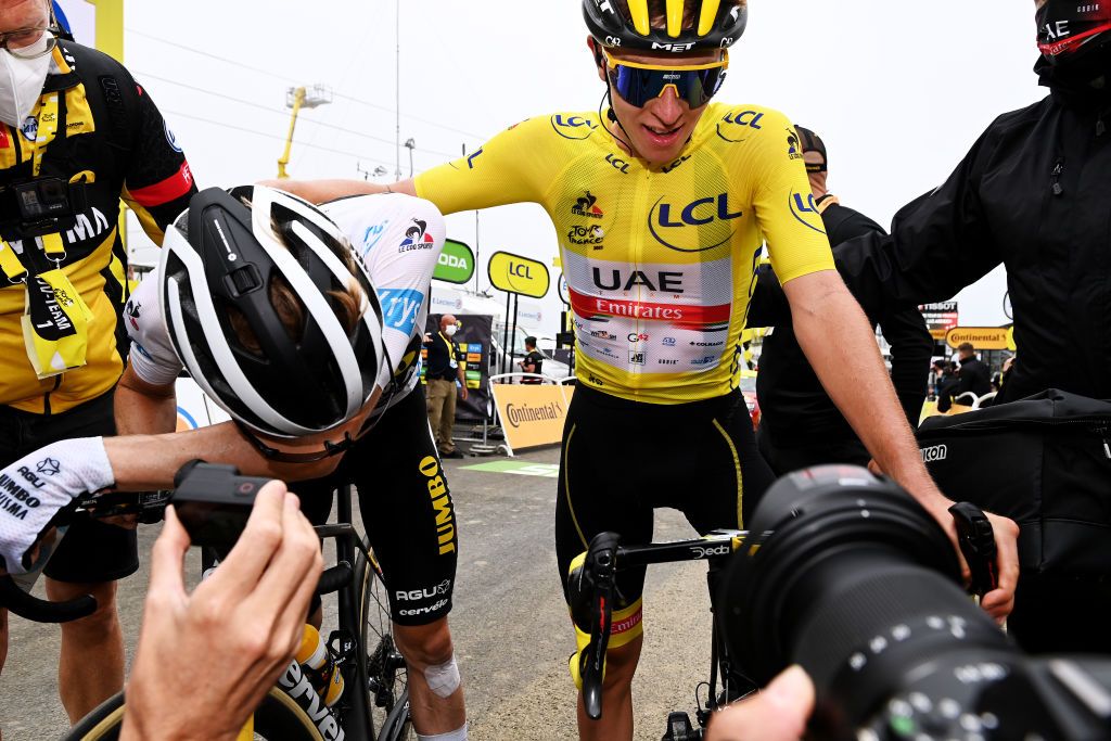 LUZ ARDIDEN FRANCE JULY 15 Jonas Vingegaard of Denmark and Team JumboVisma White Best Young Rider Jersey Tadej Pogaar of Slovenia and UAETeam Emirates Yellow Leader Jersey celebrate at arrival during the 108th Tour de France 2021 Stage 18 a 1297km stage from Pau to Luz Ardiden 1715m LeTour TDF2021 on July 15 2021 in Luz Ardiden France Photo by Pete Goding PoolGetty Images