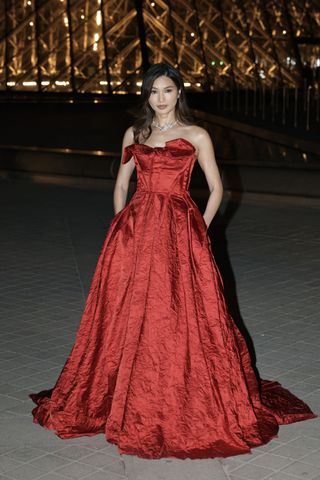 celebrity guests arrive at the inaugural grand diner du louvre in paris wearing designer fashion