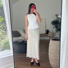 girl wearing reformation spring clothes