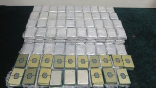 Photograph of the smuggled CPUs, some outside their containers, from the HK Customs blog post.