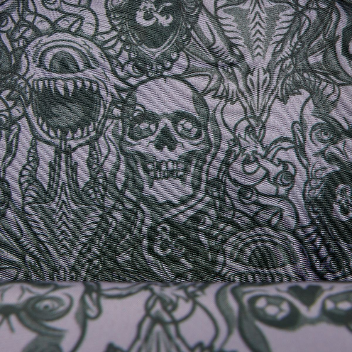 D&amp;D Loungefly Crossbody Bag interior design, featuring the faces of numerous monsters