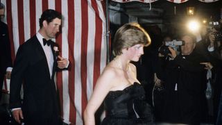Princess Diana arriving to her first public outing with Prince Charles, both are in black tie attire