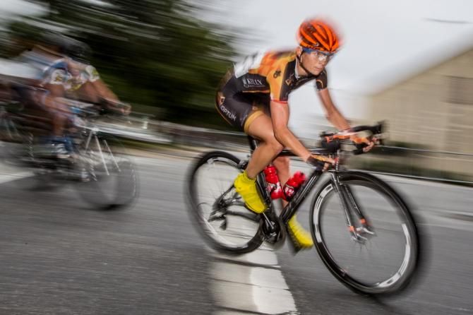Lauren Hall (Optum) in the field waiting for the race to come back together.