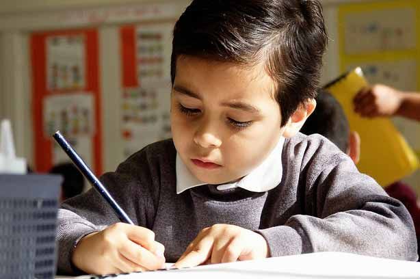 A young boy at school