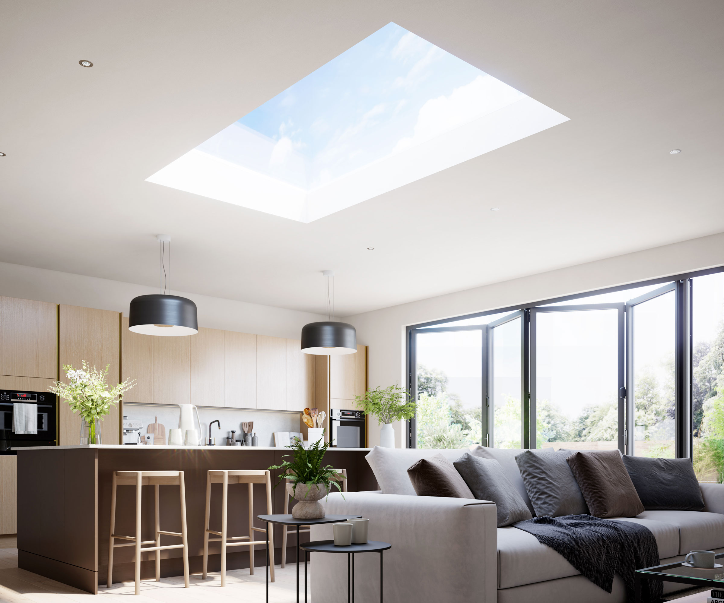 Large open plan living space with contemporary kitchen and furniture and Korniche Flat Glass rooflight