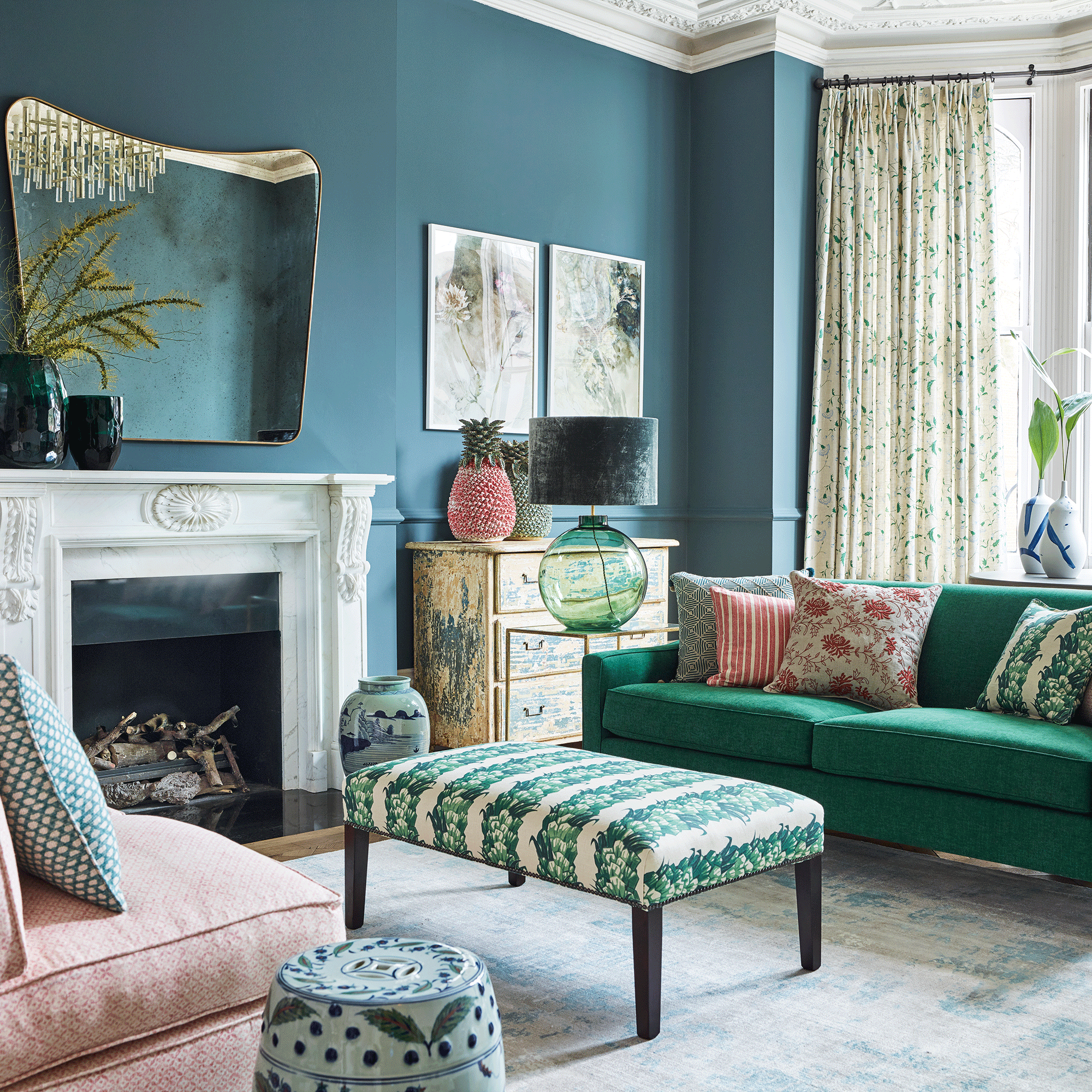 Blue living room with patterned curtains