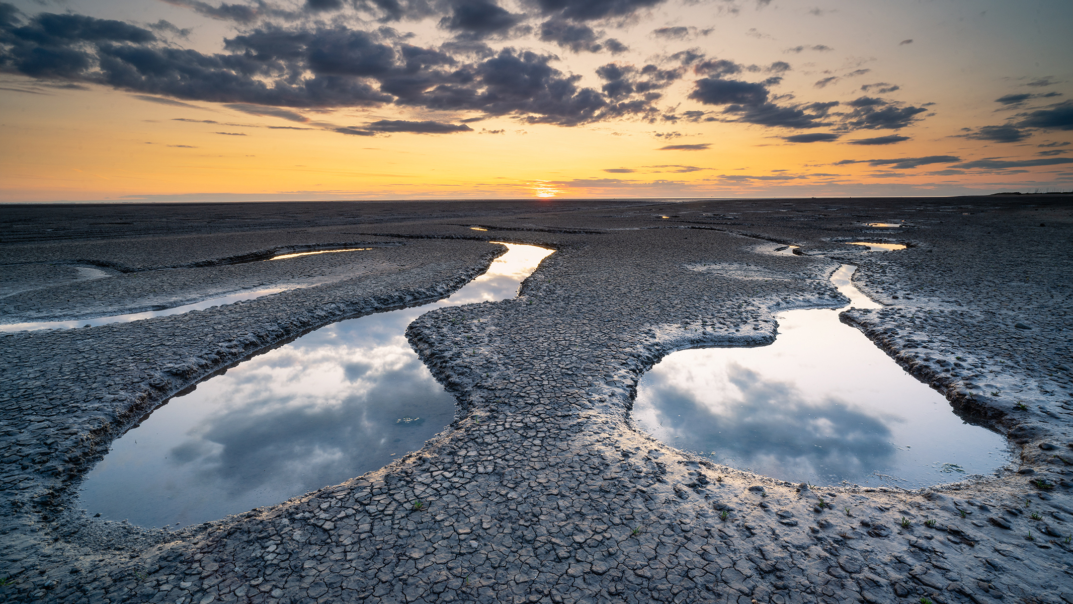 Photo of coastal mudflats taken with a Viltrox AF 16mm f/1.8 FE lens