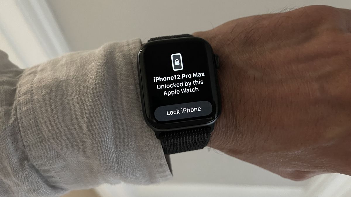 An Apple Watch showing that it has unlocked an iPhone with a Lock option