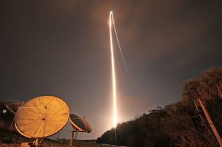 Vulcan Centaur launch showing a bright light through the sky.