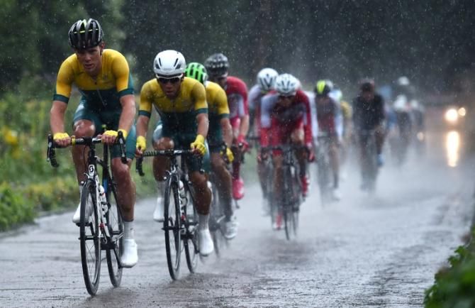 Michael Hepburn and Caleb Ewan (Australia) during a wet men's road race
