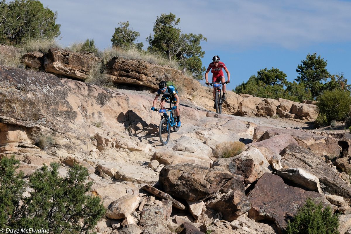 Riders descent what appears to be almost un-rideable terrain