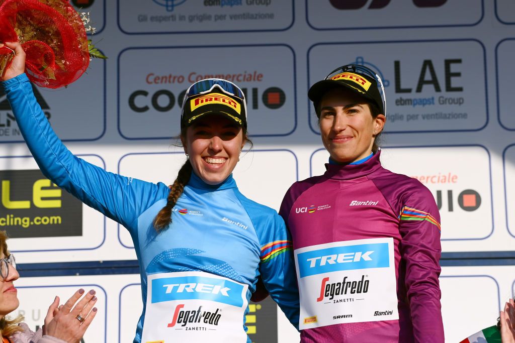 CITTIGLIO ITALY MARCH 20 LR Shirin Van Anrooij of Netherlands and Team Trek Segafredo Blue UCI best young jersey and Elisa Balsamo of Italy and Team Trek Segafredo Pink UCI Womens WorldTour Leader Jersey celebrate winning the on the podium ceremony after the 46th Trofeo Alfredo BindaComune di Cittiglio 2021 Womens Elite a 1418km one day race from Cocquio Trevisago to Cittiglio TrBinda UCIWWT on March 20 2022 in Cittiglio Italy Photo by Tim de WaeleGetty Images