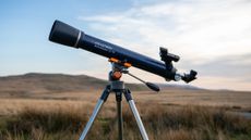 Celestron AstroMaster LT 70AZ in a field