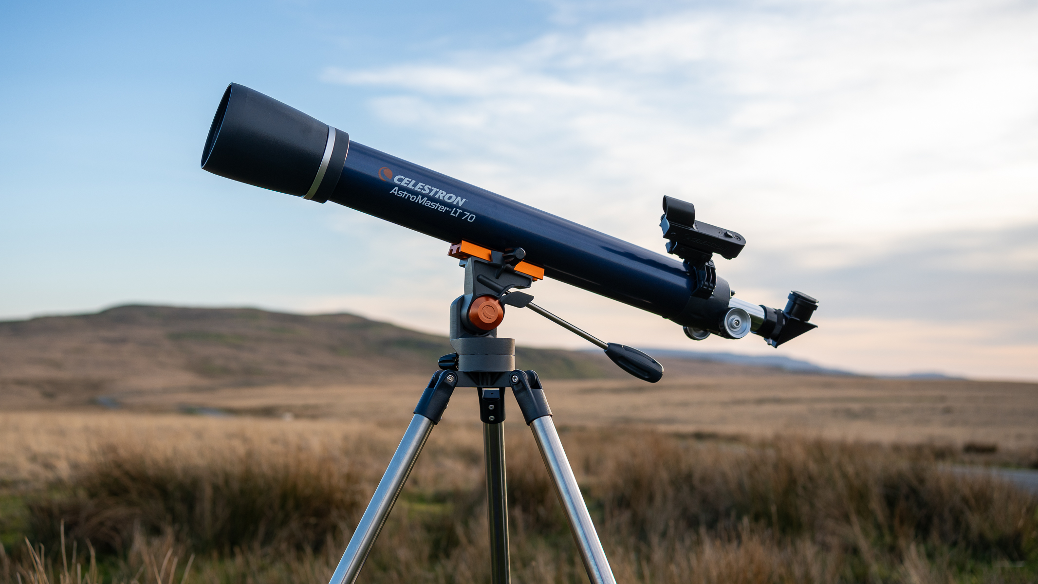 Celestron AstroMaster LT 70AZ in a field