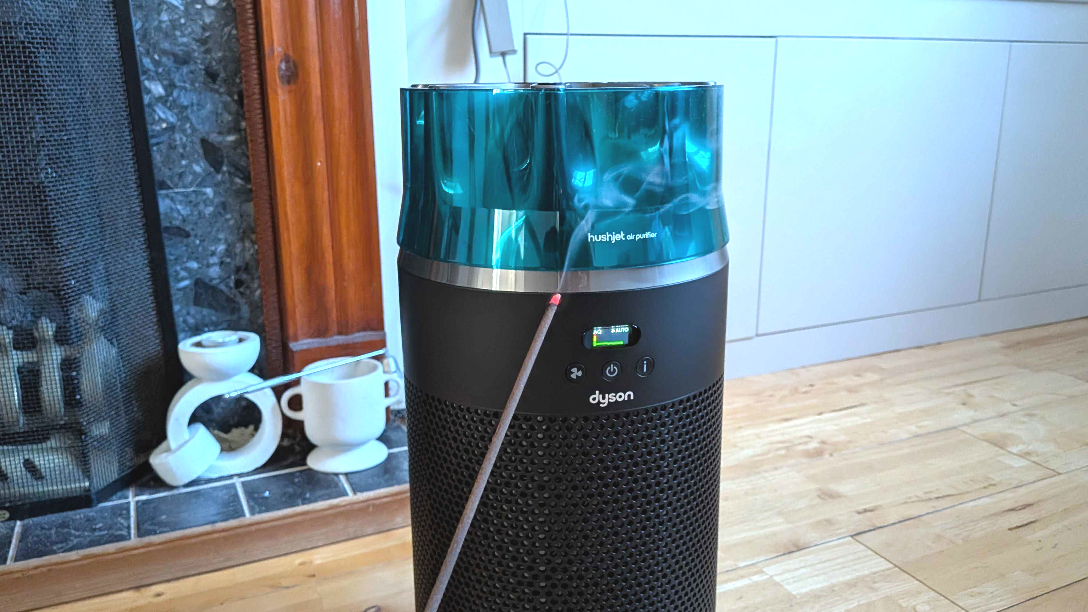 Dyson HushJet air purifier with an incense stick burning