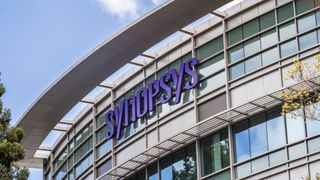 Synopsys logo on the front of glass building