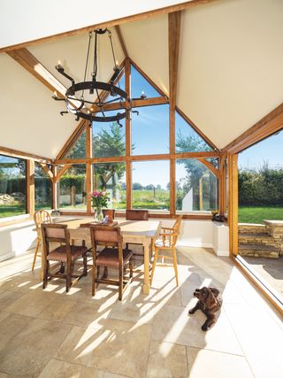 oak frame sunroom with dining table and glazed gable