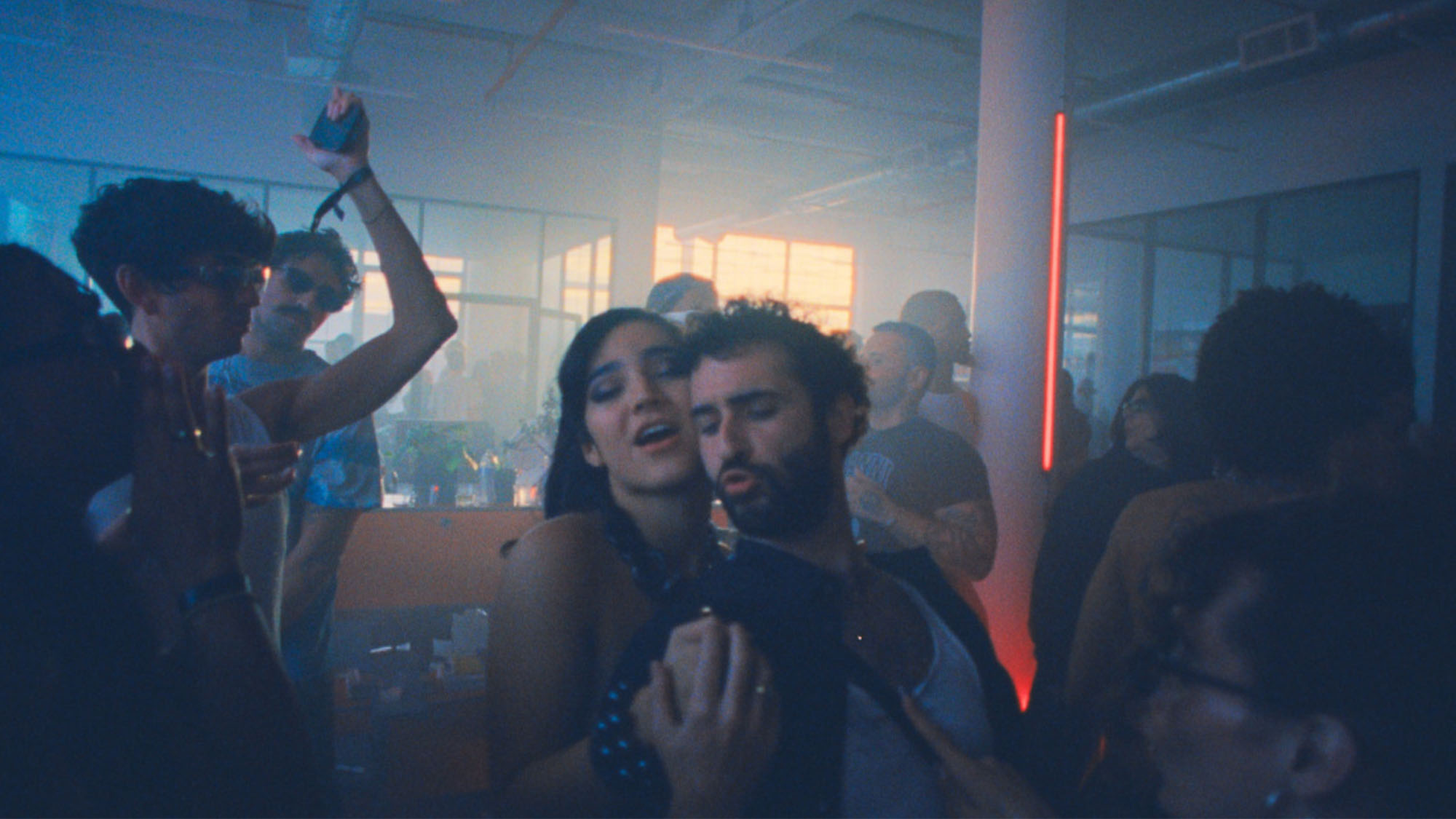 A man and woman dancing at a club together in Club Kid