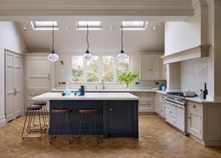 classic kitchen island with antique lighting