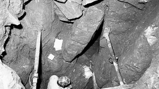 A black-and-white photo of a burial.