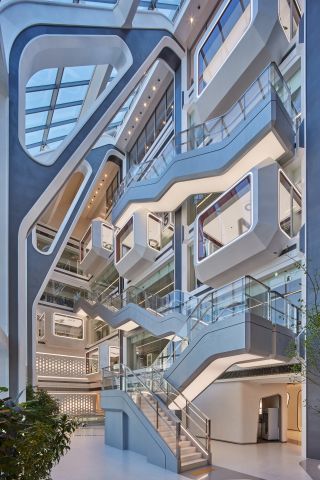 Futuristic interior atrium at YG Entertainment headquarters in Seoul