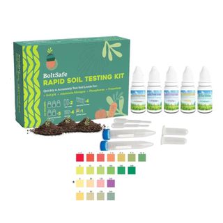 Box of BoltSafe Professional Soil Test Kit on the left with pipettes and bottles of solution on the right