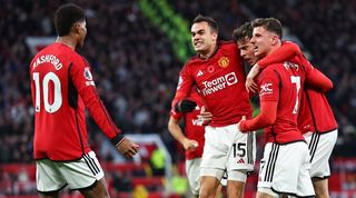 Victor Lindelof celebrates with his Manchester United team-mates after scoring against Luton in November 2023.