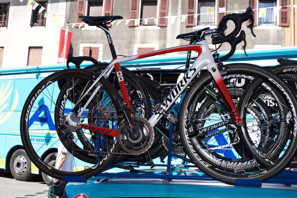 Aru's spare bike sits on the outside of the Astana team car