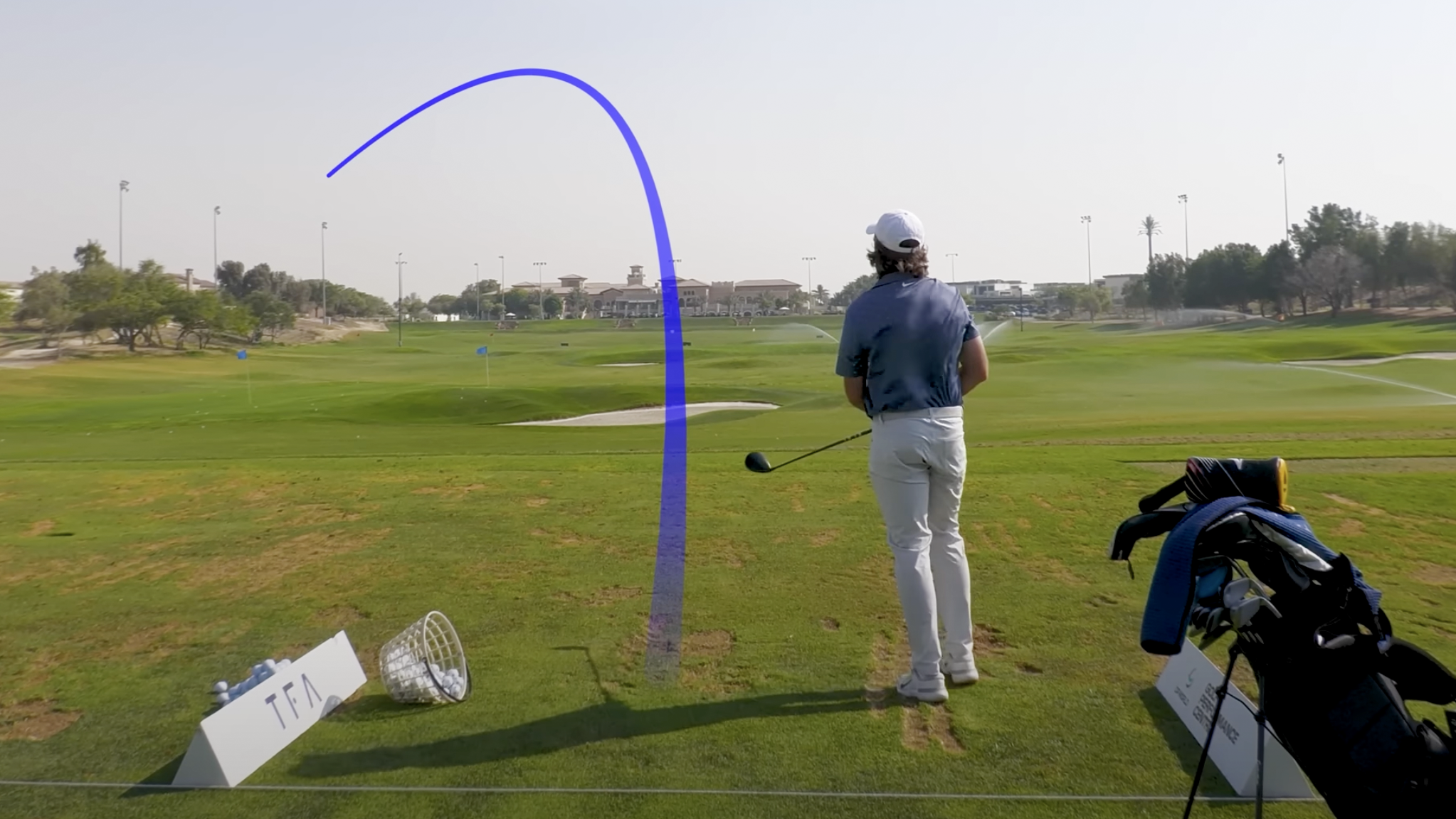 Photo of tommy fleetwood hitting a big slice with a left-handed driver