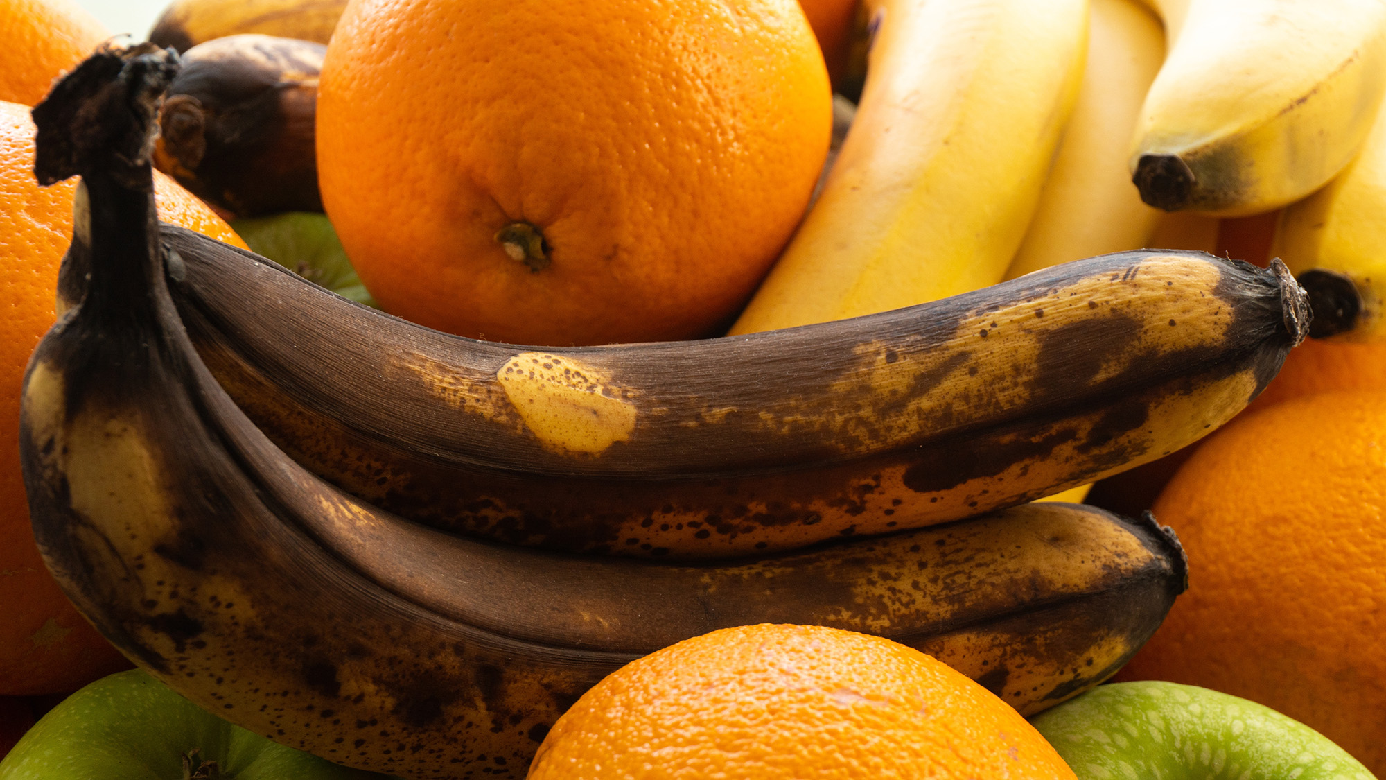 Fruit bowl with overripe bananas