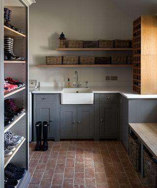 laundry room with cabinets and shelf