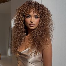 Woman with an amber bronze hair color