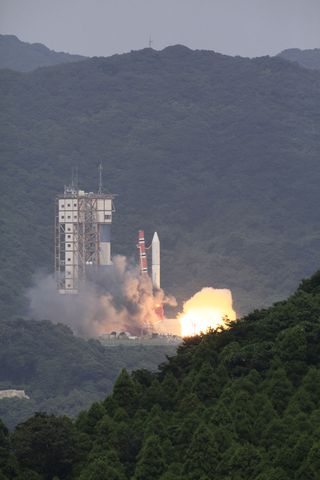 Japan's brand-new Epsilon rocket launches on its debut mission from Uchinoura Space Center on Sept. 14, 2013 carrying the SPRINT-A (Hisaki) space telescope.
