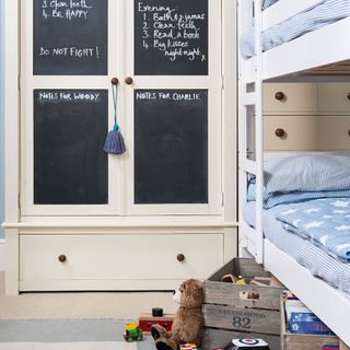 boys bedroom with cupboard and toys